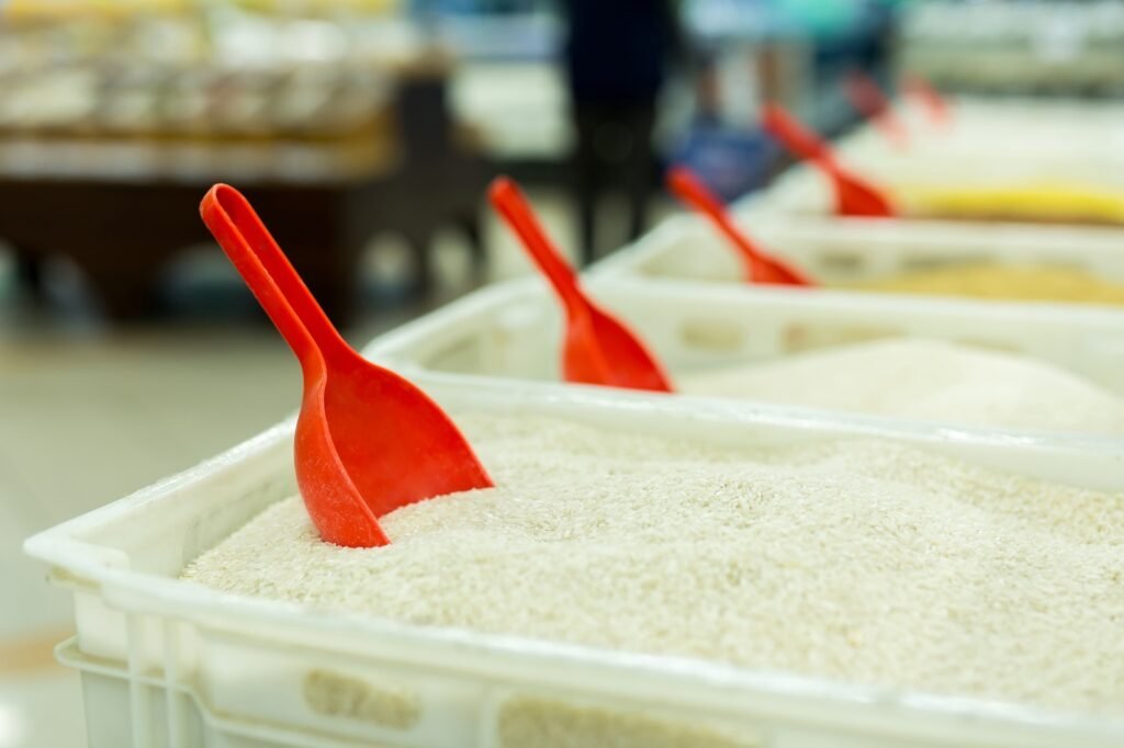 Rice and other cereals on the counter in the supermarket. buying groats in the stor